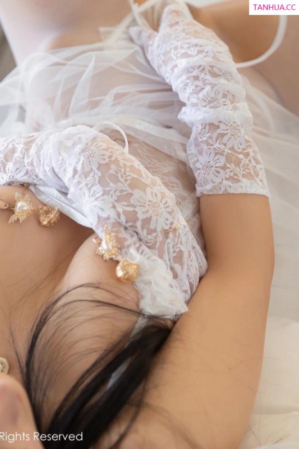   [XiuRen]高清写真图 2023.06.29 No.6994 谭小灵 婚纱美腿第27张图片